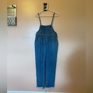 Denim overalls w/ raw hems